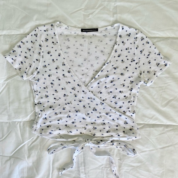 Brandy Melville Tops - *SOLD* Brandy White Floral Thermal Rae Wrap Top